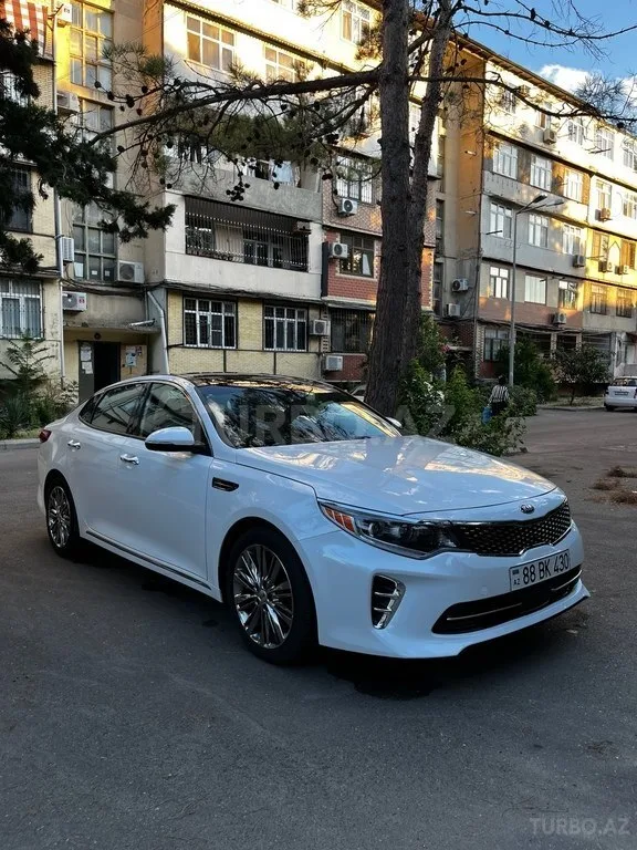 Kia Optima — foto 2/4