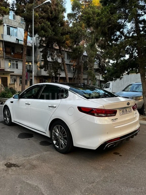 Kia Optima — foto 4/4