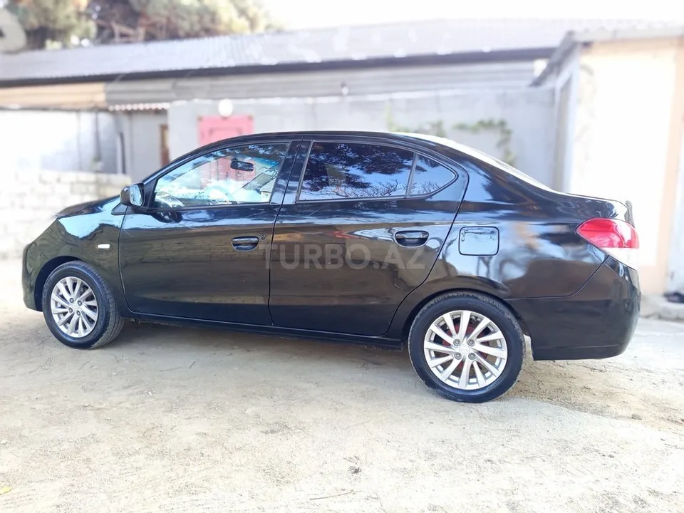 Mitsubishi Attrage — foto 4/4