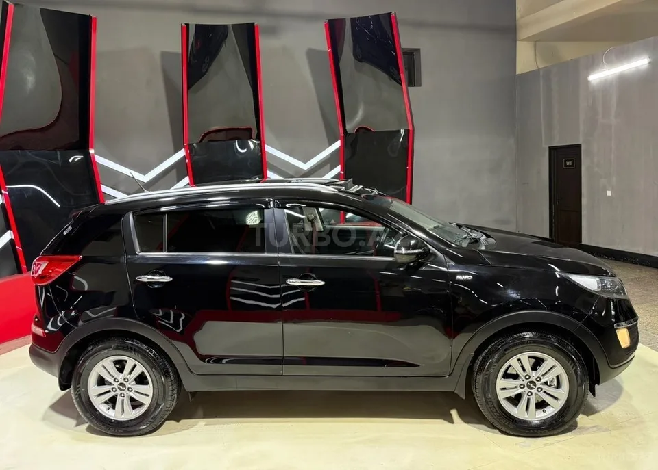 Kia Sportage — foto 4/4