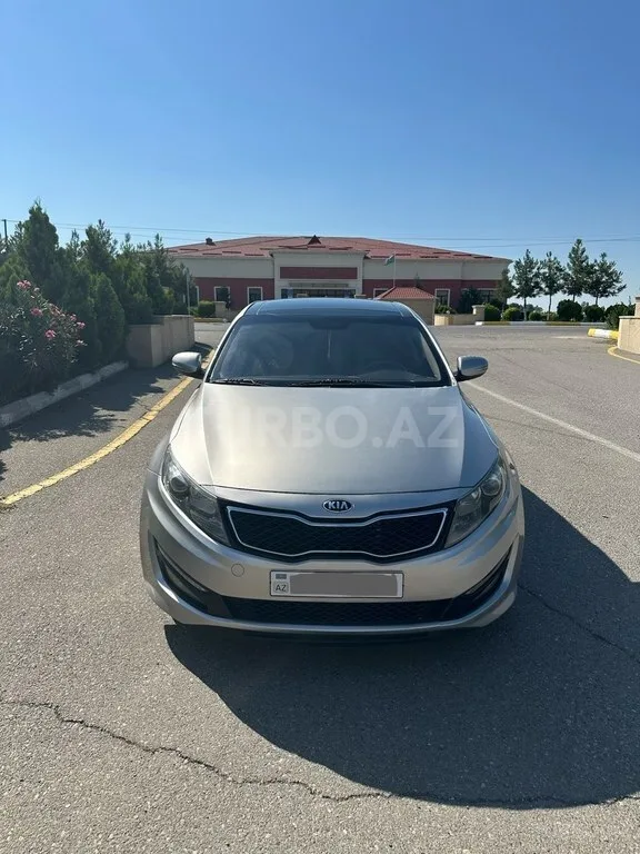 Kia Optima — foto 1/4