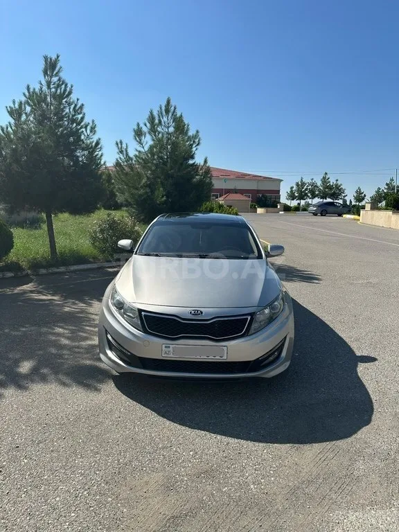 Kia Optima — foto 2/4