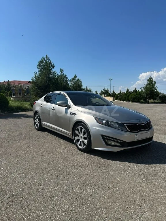 Kia Optima — foto 4/4