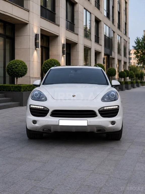 Porsche Cayenne — foto 1/4