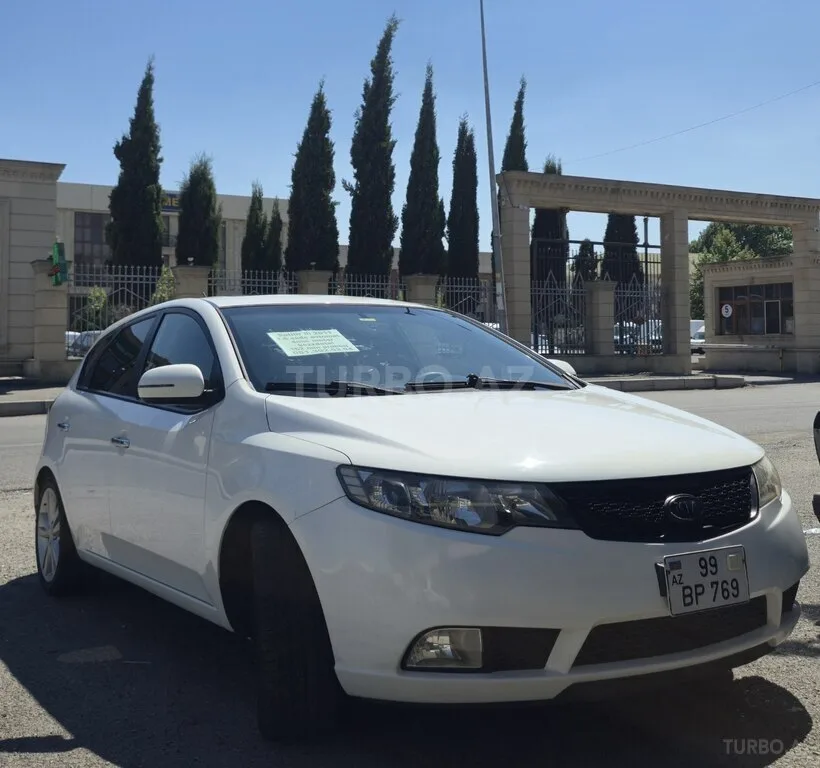 Kia Cerato — foto 2/4