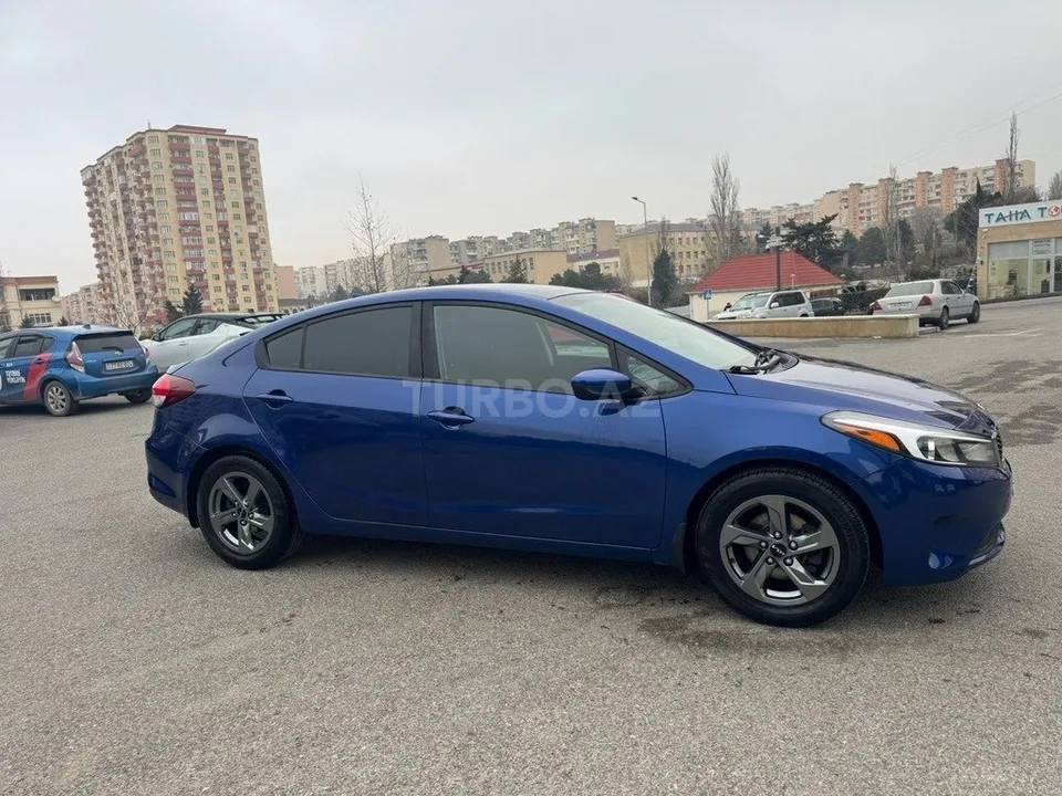 Kia Forte — foto 4/4