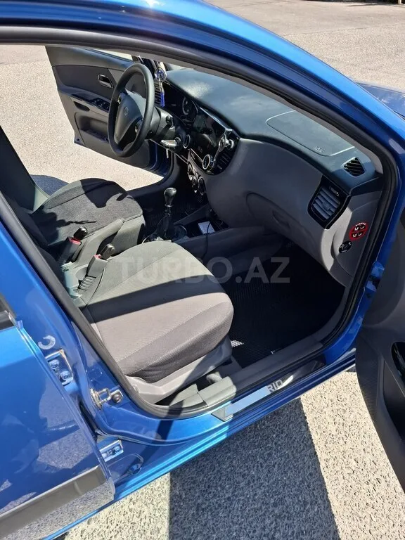 Kia Rio — foto 4/4