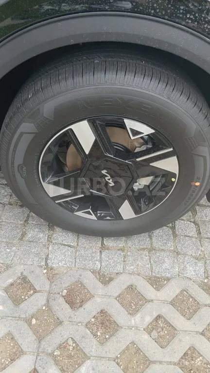 Kia Sportage — foto 2/4