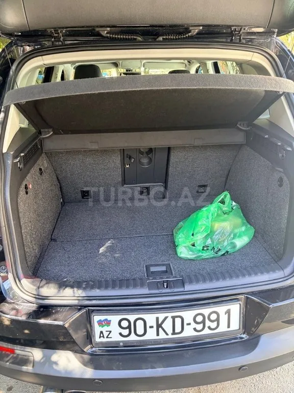 Volkswagen Tiguan — foto 2/4