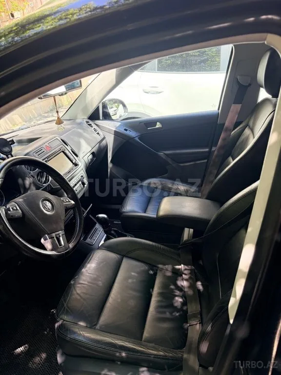 Volkswagen Tiguan — foto 3/4