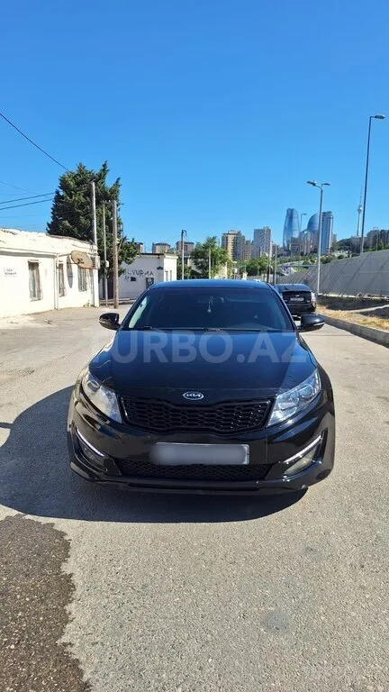 Kia Optima — foto 1/4