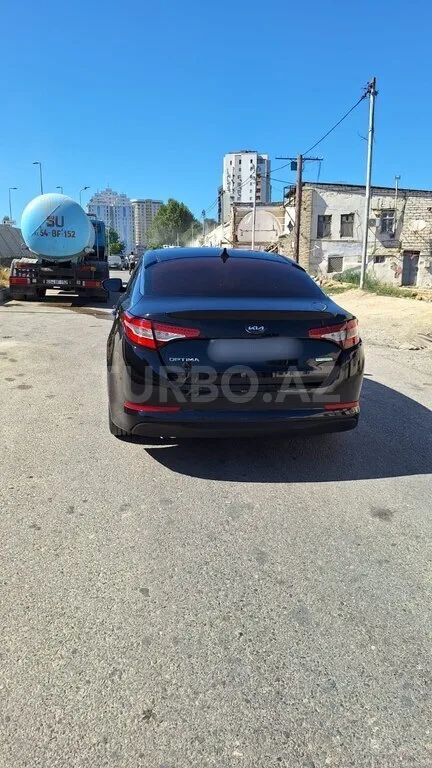 Kia Optima — foto 2/4