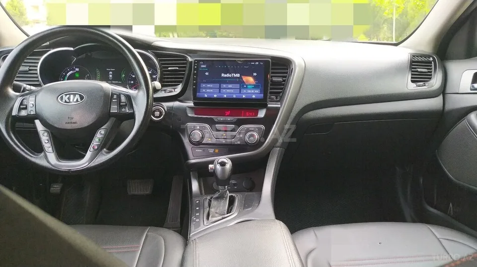 Kia Optima — foto 3/4