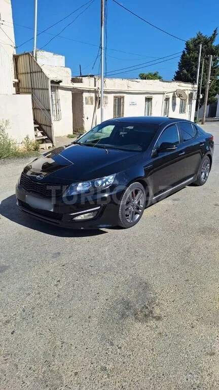 Kia Optima — foto 4/4