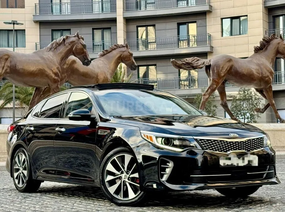 Kia Optima — foto 1/4