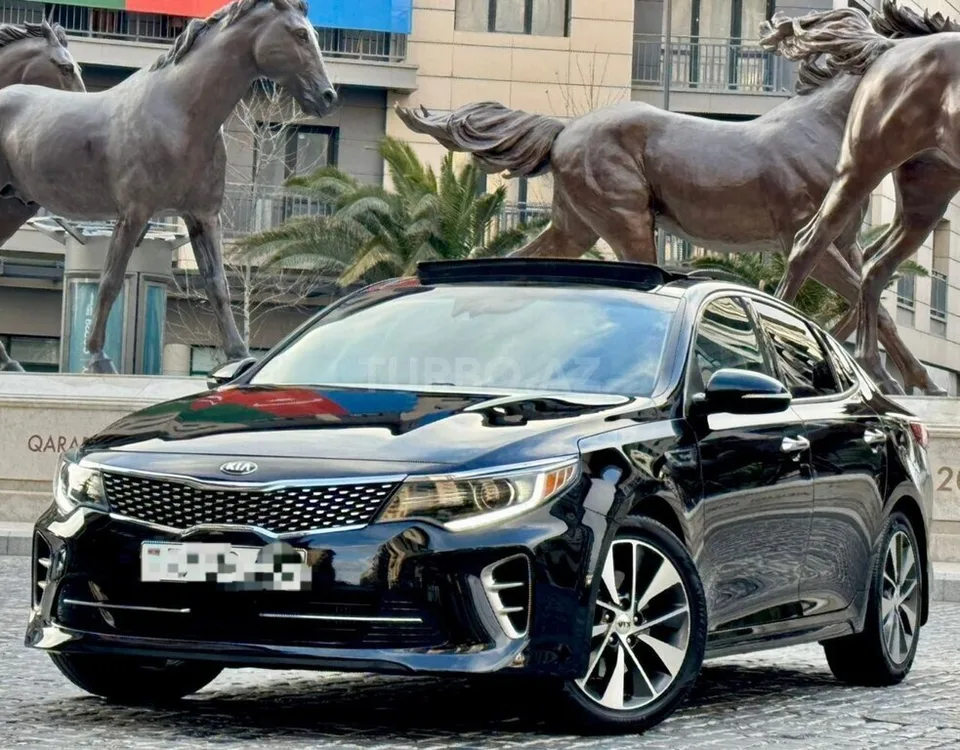 Kia Optima — foto 2/4