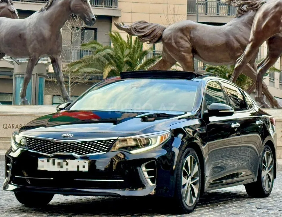 Kia Optima — foto 4/4