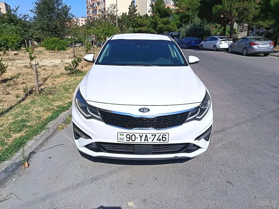 Kia Optima — foto 1/4