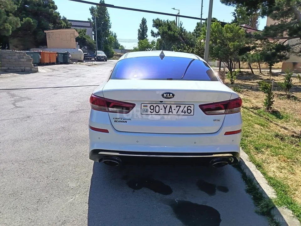 Kia Optima — foto 2/4