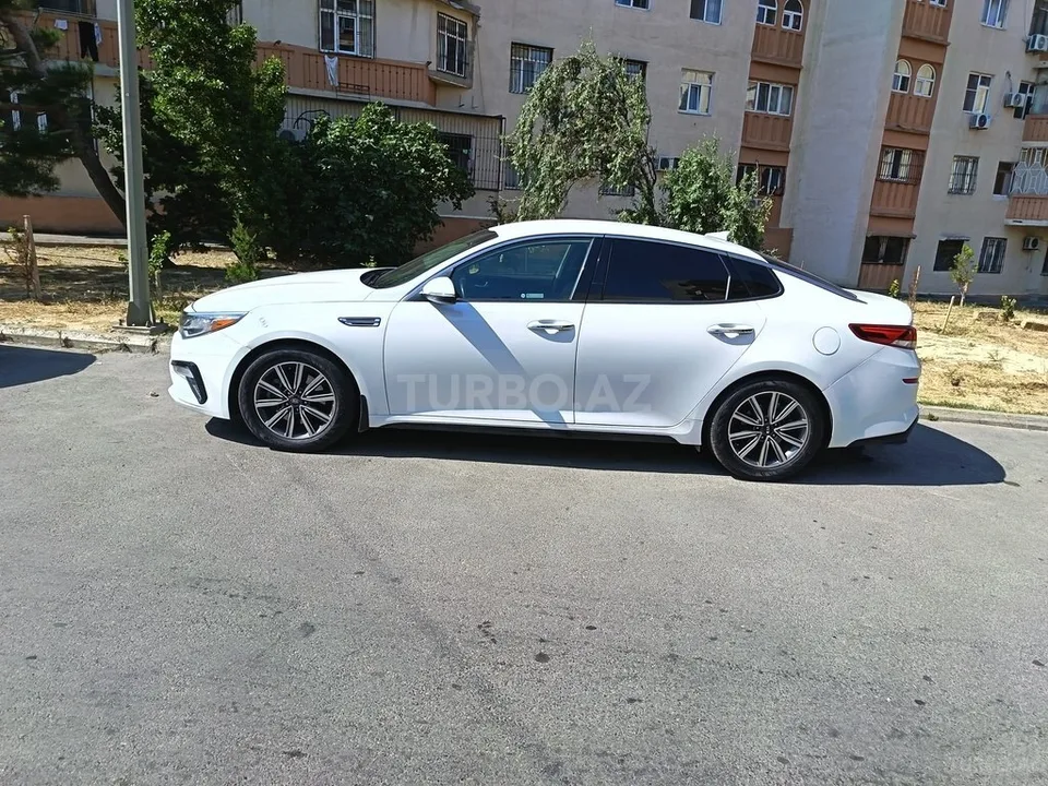 Kia Optima — foto 4/4