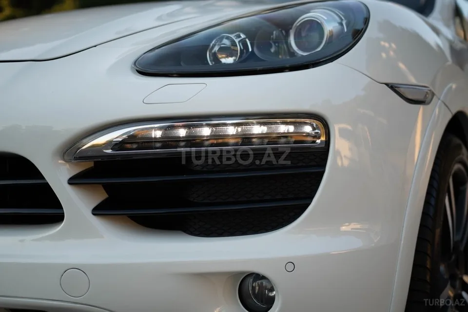 Porsche Cayenne — foto 4/4