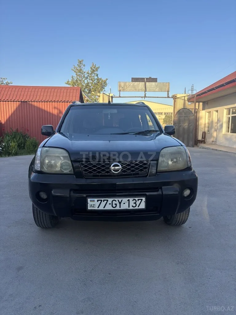 Nissan X-Trail — foto 1/4