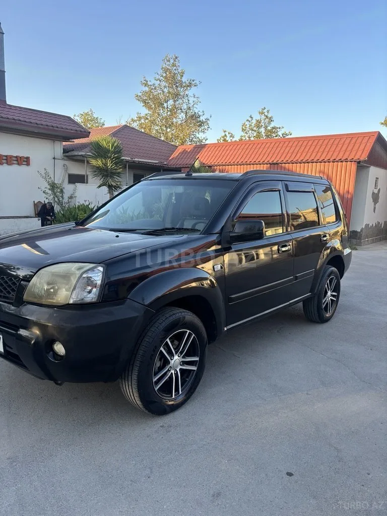 Nissan X-Trail — foto 2/4