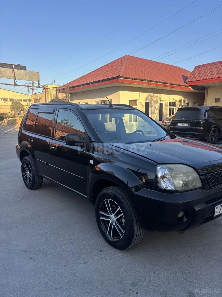 Nissan X-Trail — foto 3/4