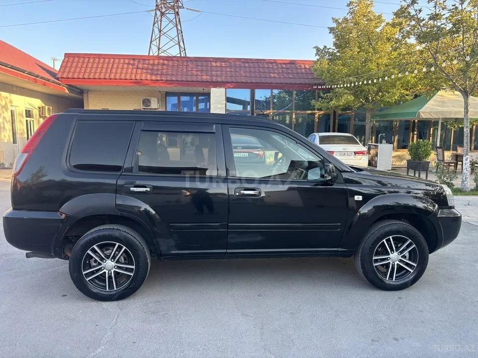 Nissan X-Trail — foto 4/4