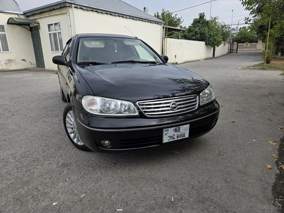 Nissan Sunny — foto 1/4
