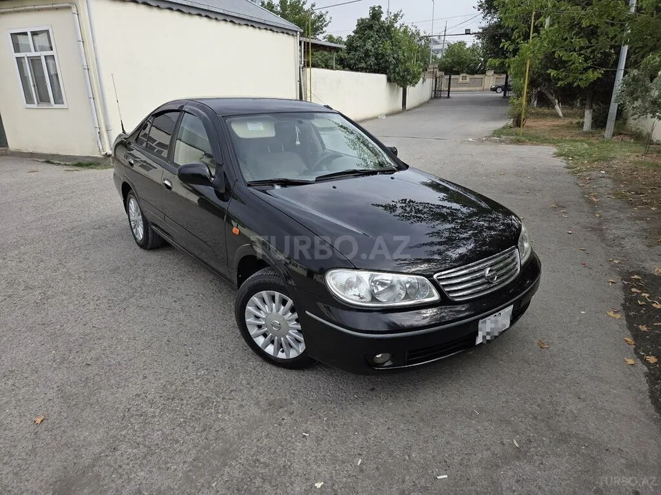 Nissan Sunny — foto 2/4
