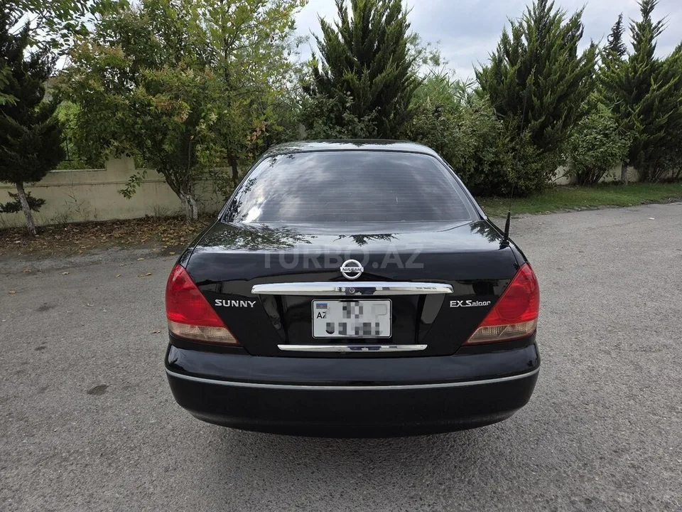 Nissan Sunny — foto 3/4