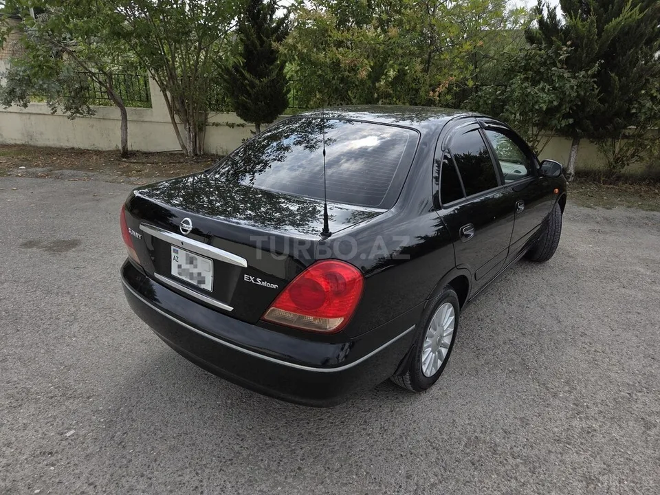 Nissan Sunny — foto 4/4