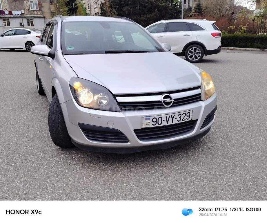 Opel Astra — фото 2/4