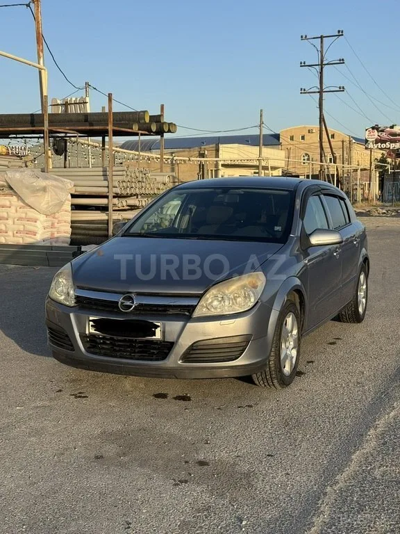 Opel Astra — фото 1/4
