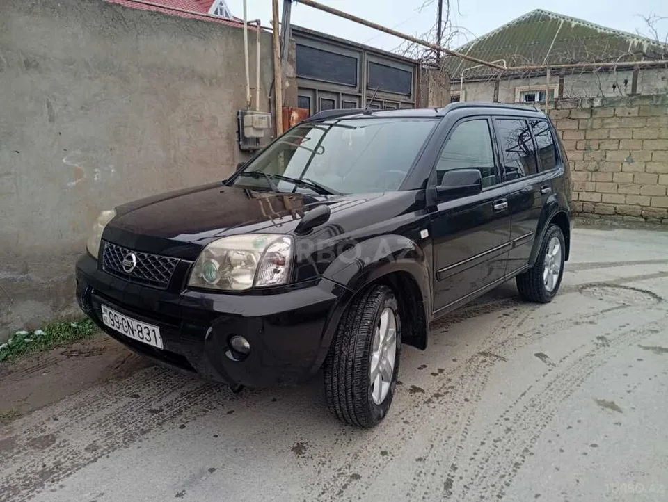 Nissan X-Trail — foto 1/4
