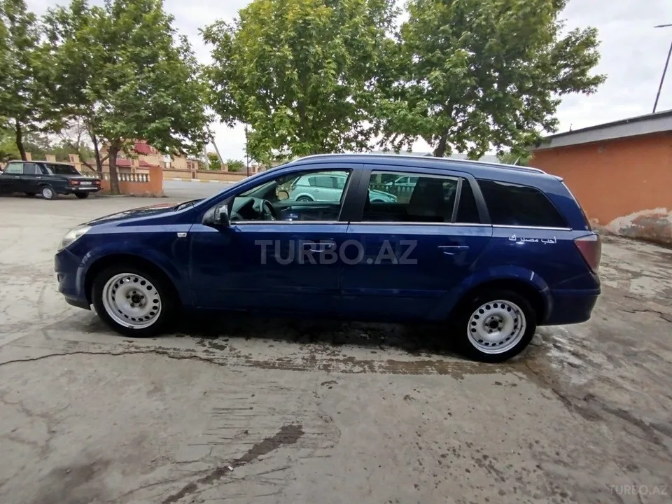 Opel Astra — фото 3/4