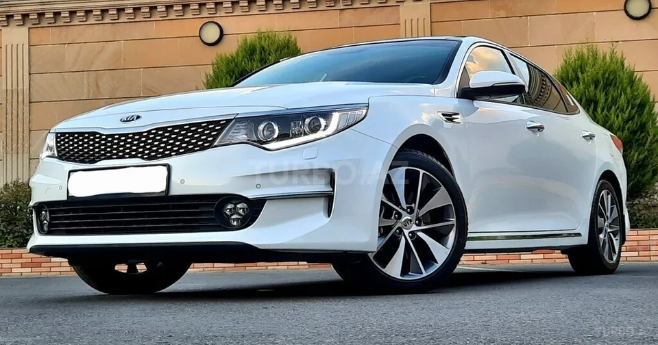 Kia Optima — foto 1/4