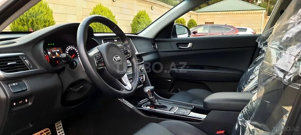 Kia Optima — foto 2/4