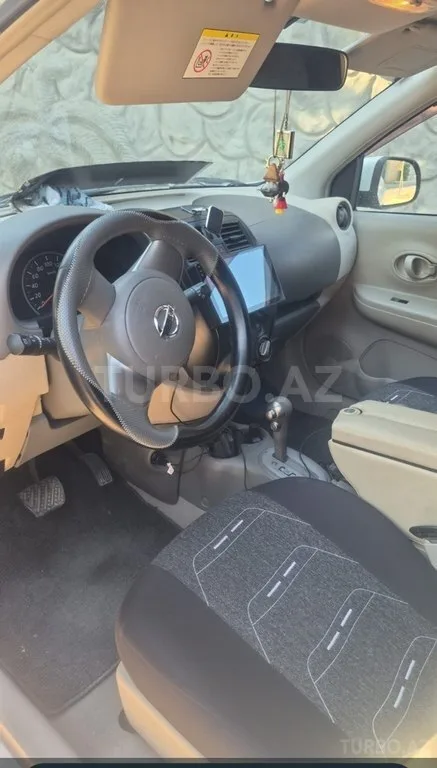 Nissan March — foto 4/4