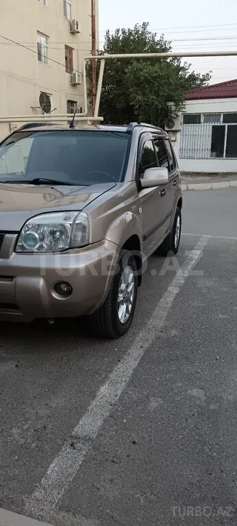 Nissan X-Trail — foto 4/4