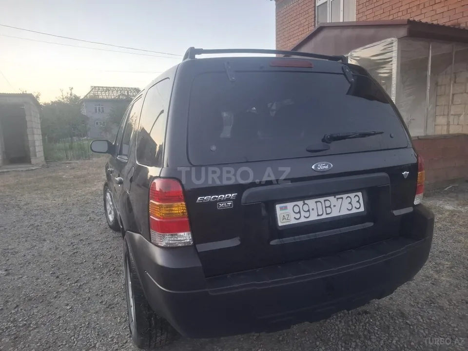 Ford Escape — foto 4/4