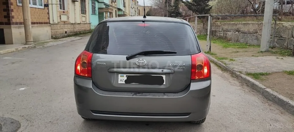 Toyota Corolla — foto 2/4