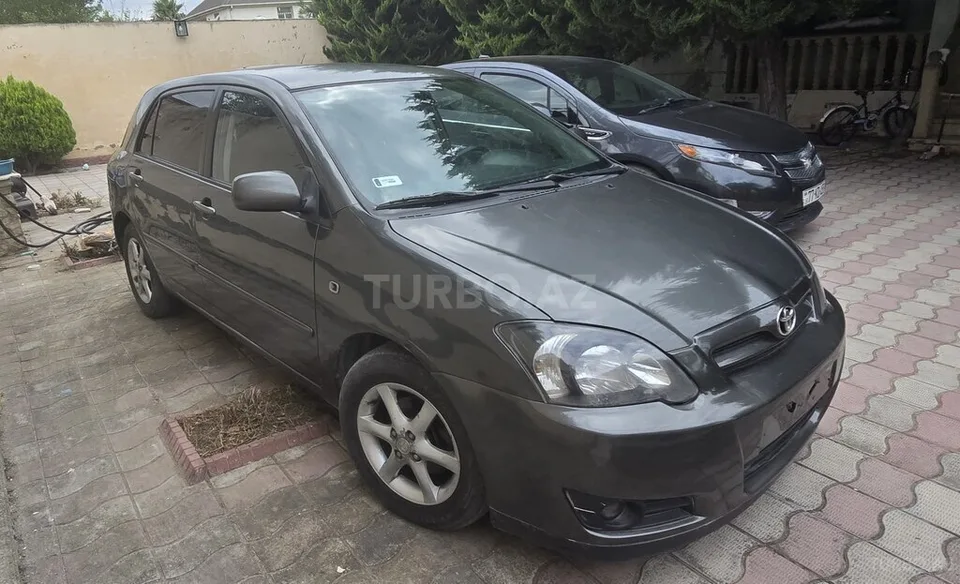 Toyota Corolla — foto 3/4
