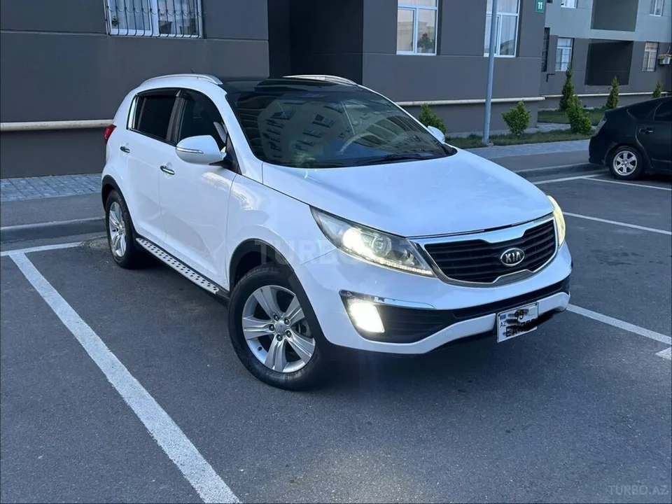 Kia Sportage — foto 2/4