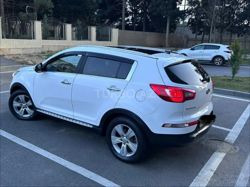 Kia Sportage — foto 4/4