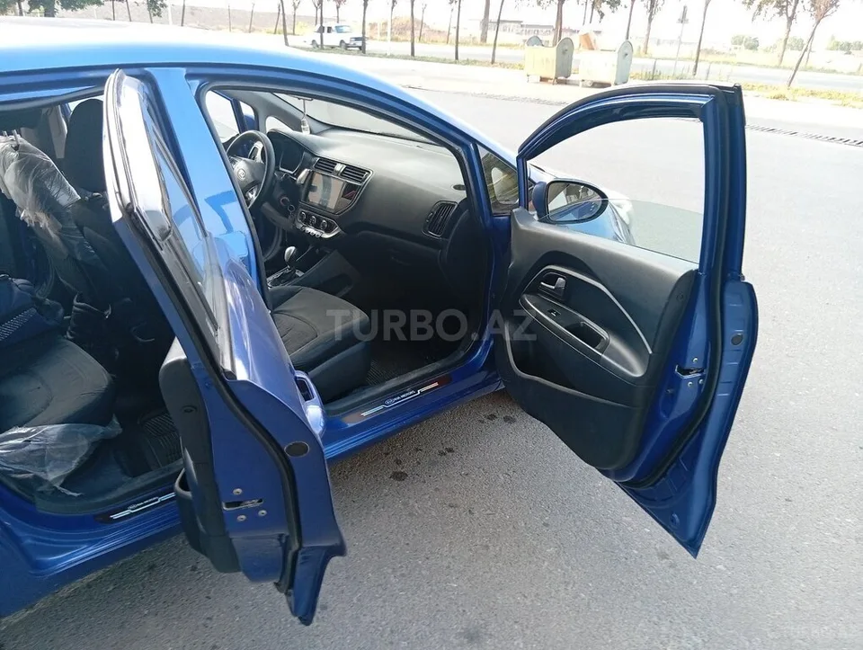 Kia Rio — foto 3/4