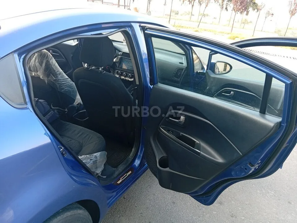 Kia Rio — foto 4/4