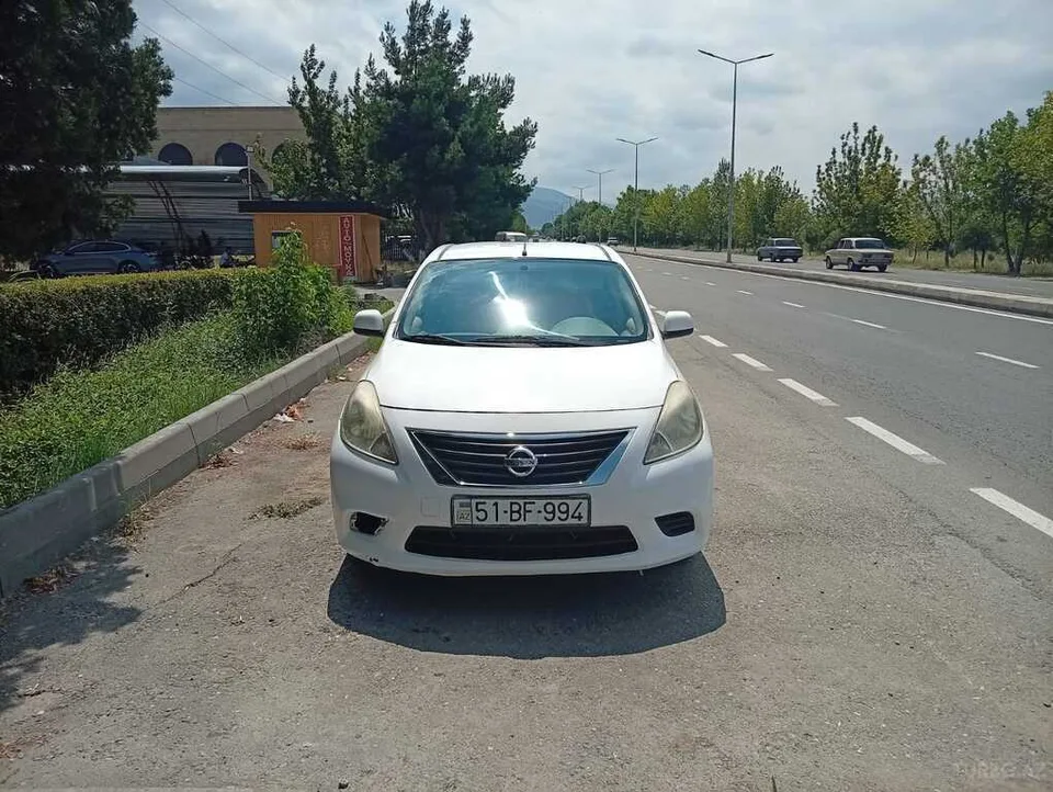 Nissan Sunny — foto 1/4