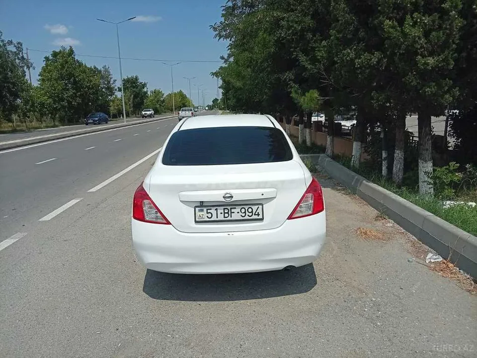 Nissan Sunny — foto 2/4